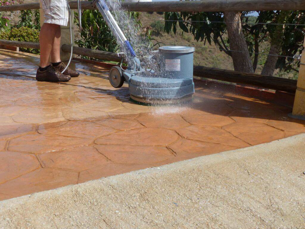 Imprinted Concrete Clean With Water And Brush Rotative Machine